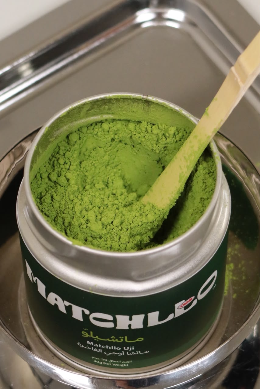 Open tin of MATCHLLO Uji matcha powder